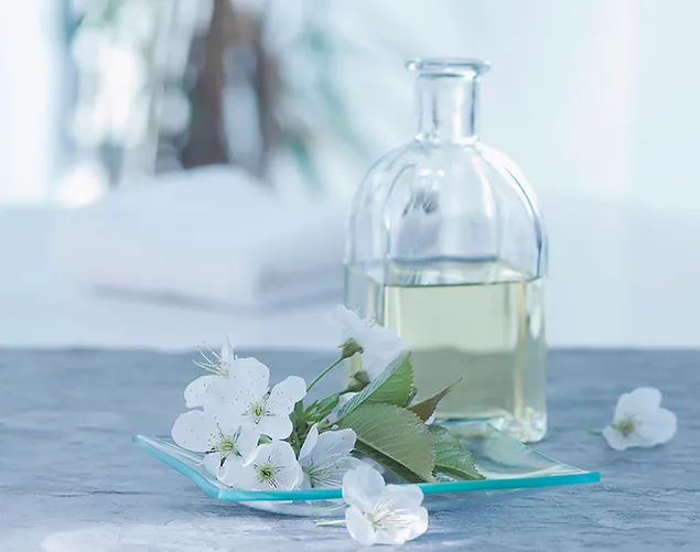 Essential oil bottle with flowers